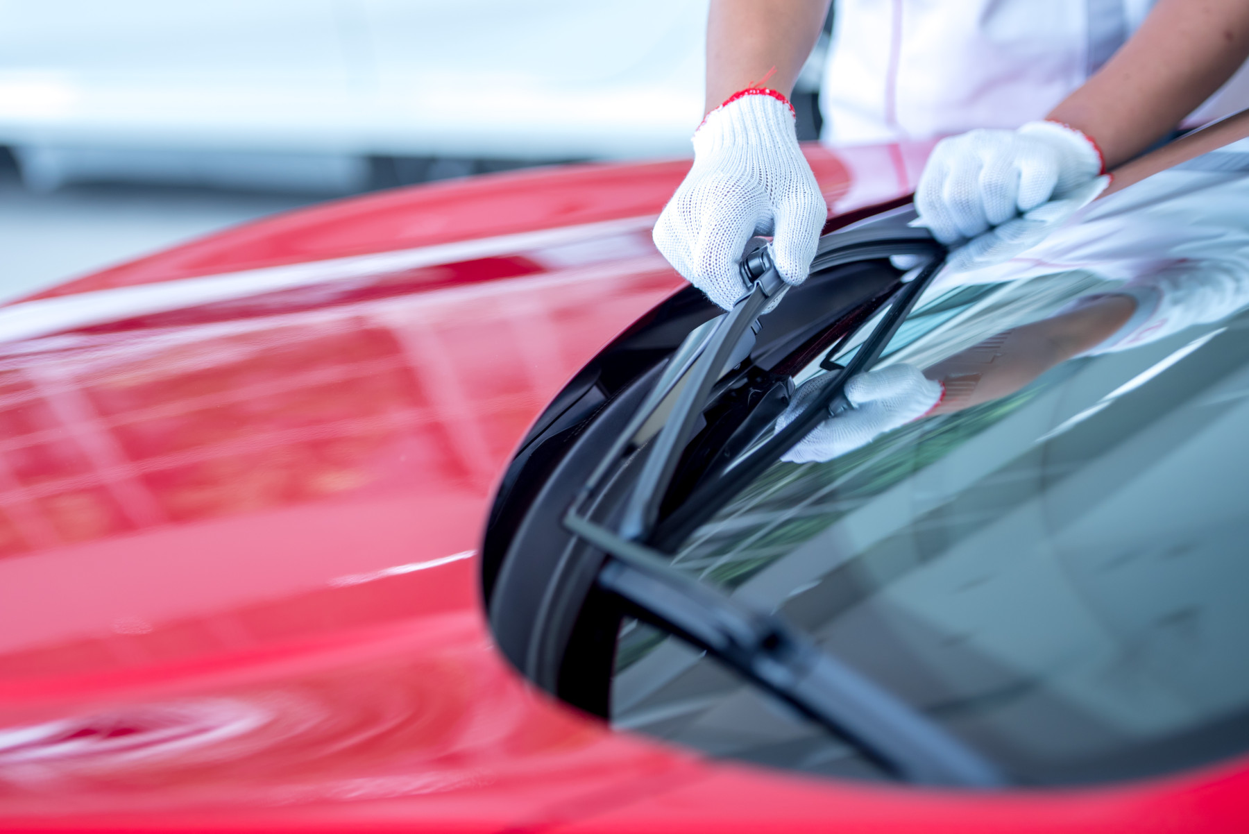 Chevy service technician changing windshield wipers
