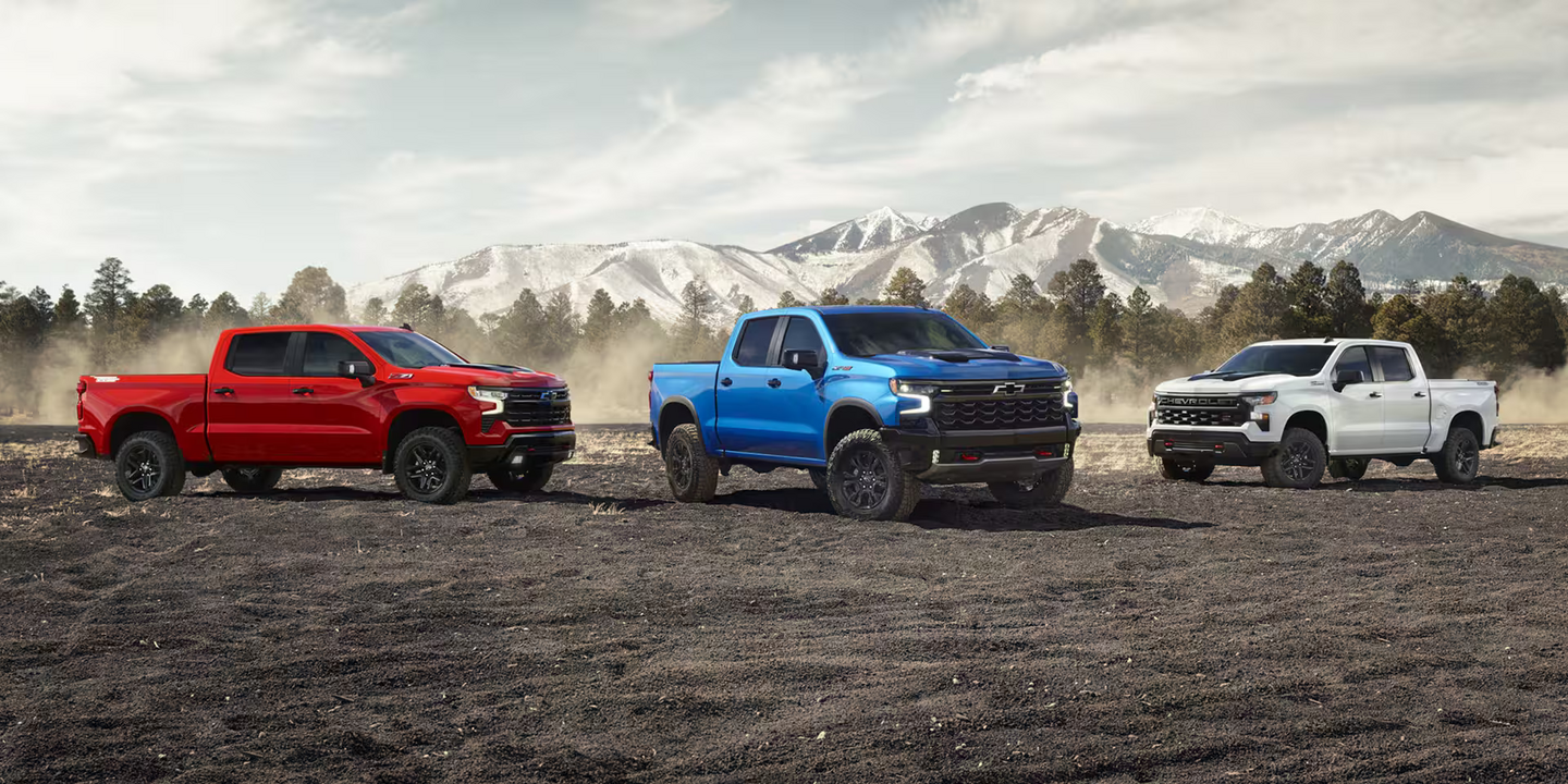 Three parked 2026 Chevrolet Silverado 1500 models