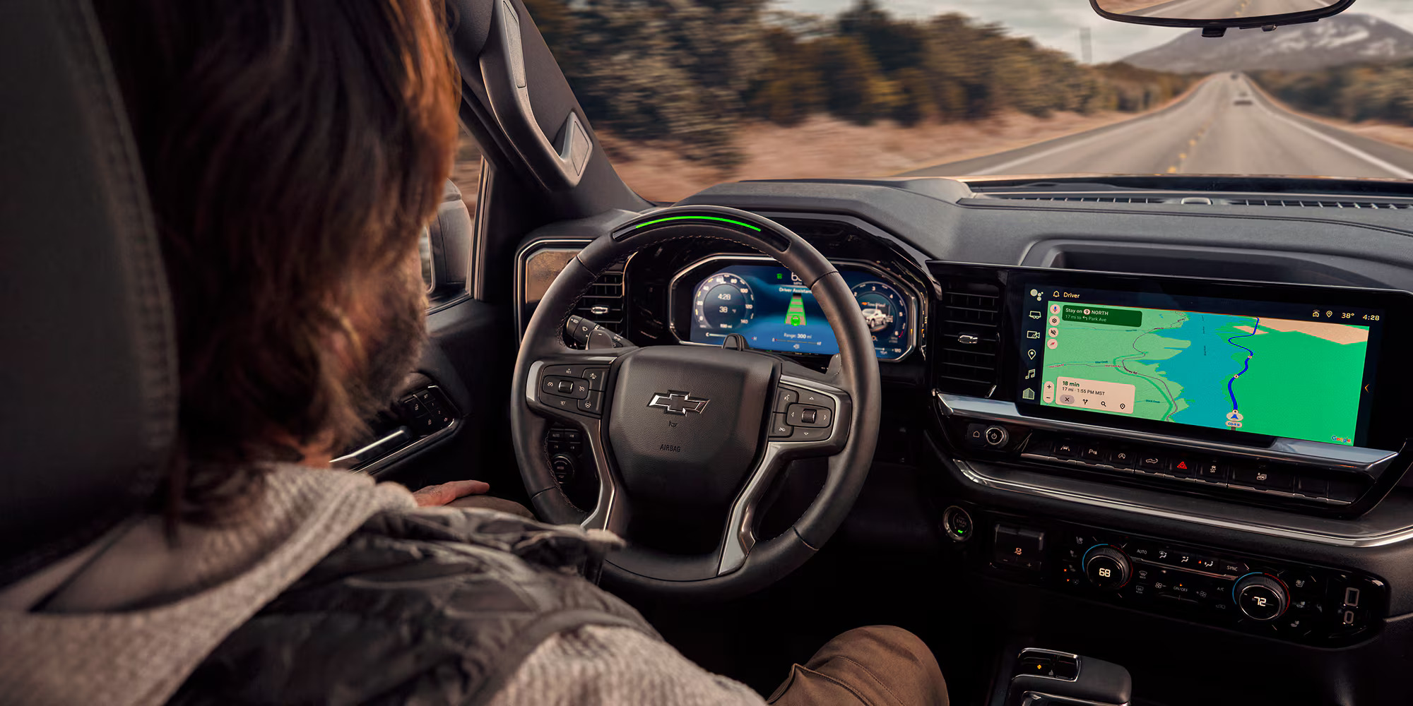 2026 Chevrolet Silverado 1500 interior with a driver behind the wheel.