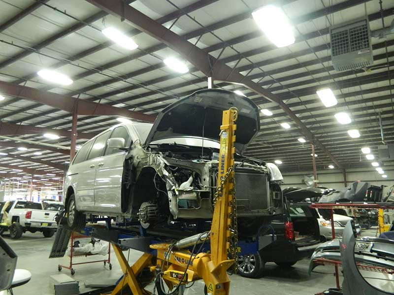 A van on jacks getting repaired