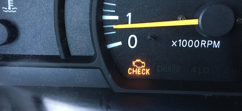 Check engine light on dashboard