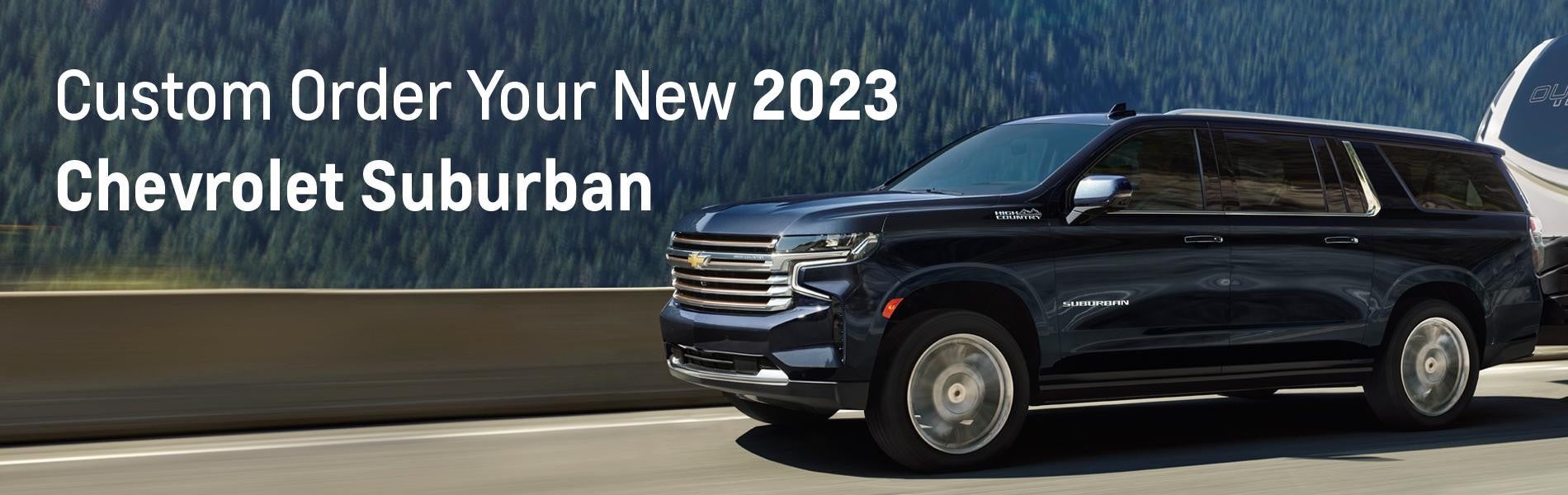 Chevy Suburban down a road